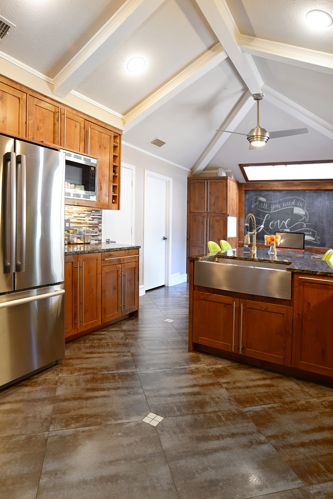 Large transitional u-shaped travertine floor eat-in kitchen photo in Dallas with a farmhouse sink, medium tone wood cabinets, granite countertops, multicolored backsplash, matchstick tile backsplash, stainless steel appliances and a peninsula