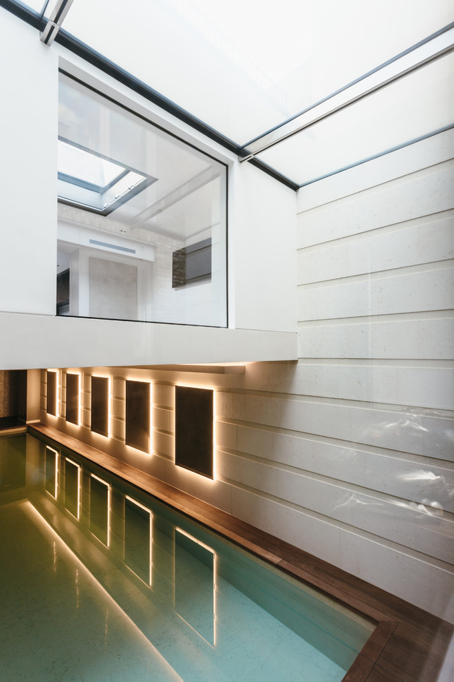 This is an example of a large contemporary pool in London.