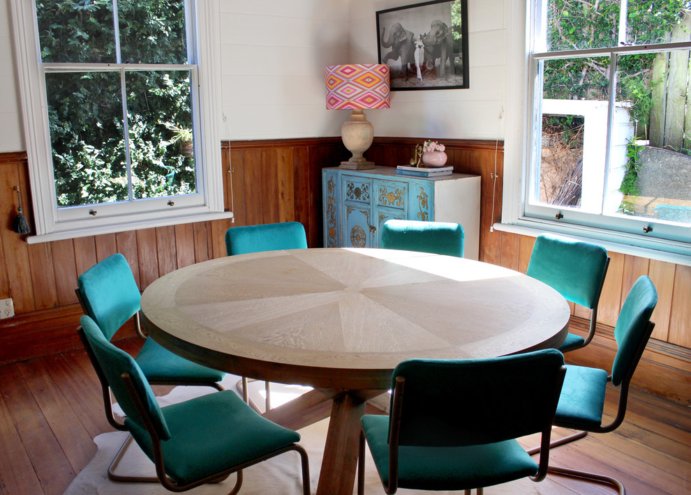 This is an example of an eclectic dining room in Napier-Hastings.
