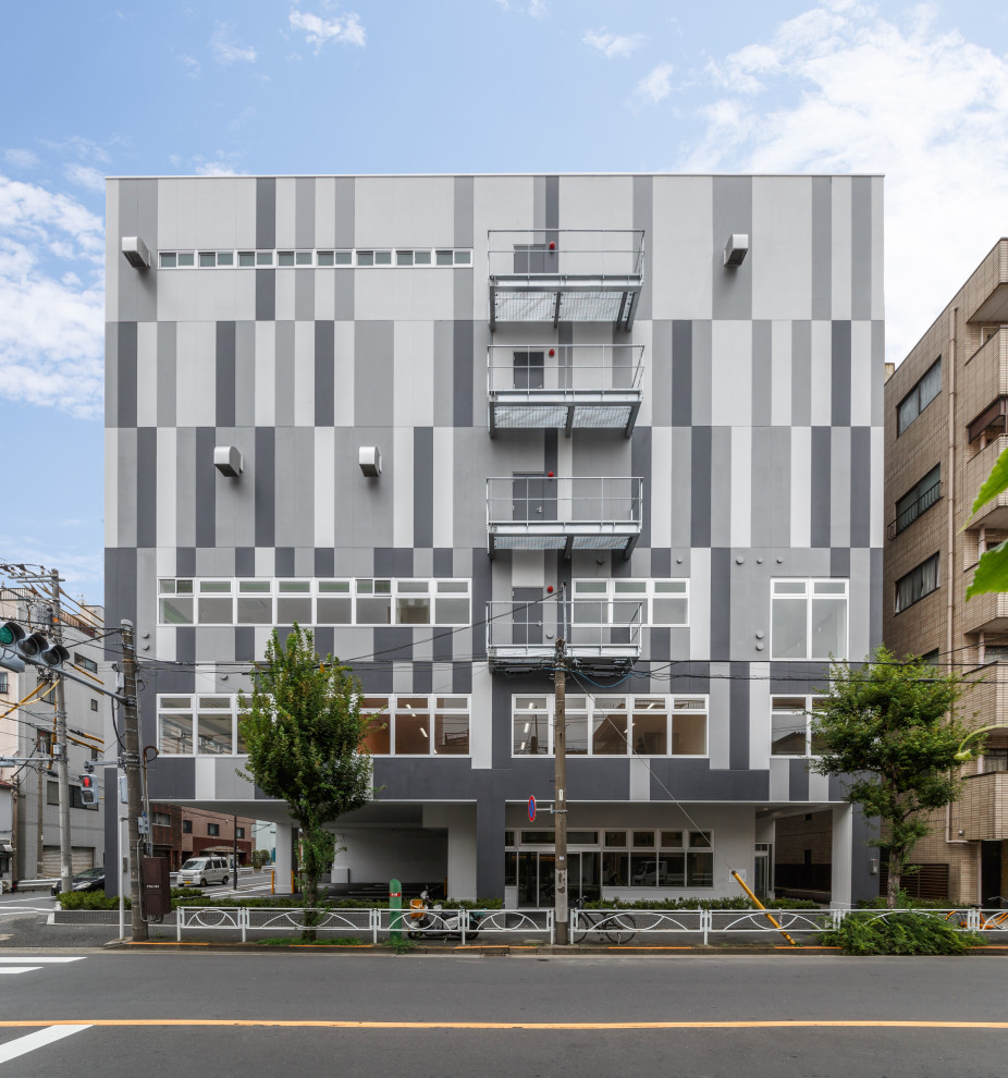 Geräumige Skandinavische Dachbegrünung mit grauer Fassadenfarbe und Flachdach in Tokio