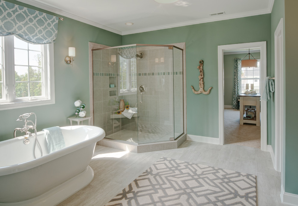 Photo of a large beach style master bathroom in Richmond with a freestanding tub, a corner shower, green walls, beige tile, ceramic tile, ceramic floors, beige floor and a hinged shower door.