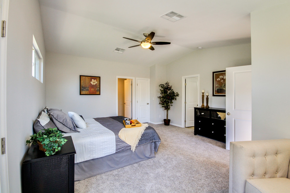 Example of a transitional bedroom design in Phoenix