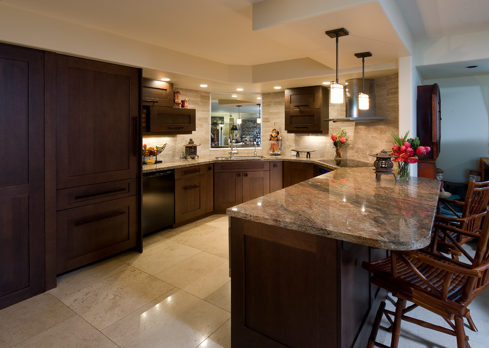 Photo of a small asian u-shaped eat-in kitchen in Hawaii with shaker cabinets, dark wood cabinets, granite benchtops, beige splashback, stone tile splashback, panelled appliances, marble floors and a peninsula.
