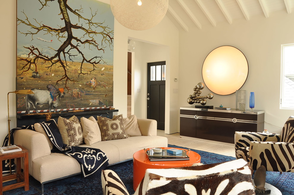 Design ideas for an eclectic open concept family room in San Francisco with white walls.