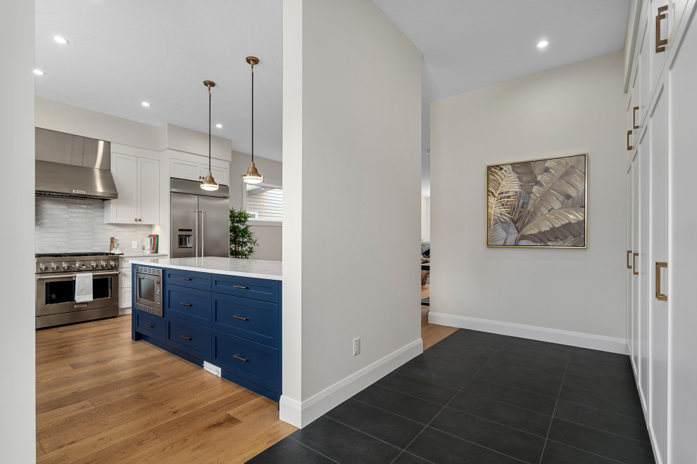 Transitional home design photo in Calgary