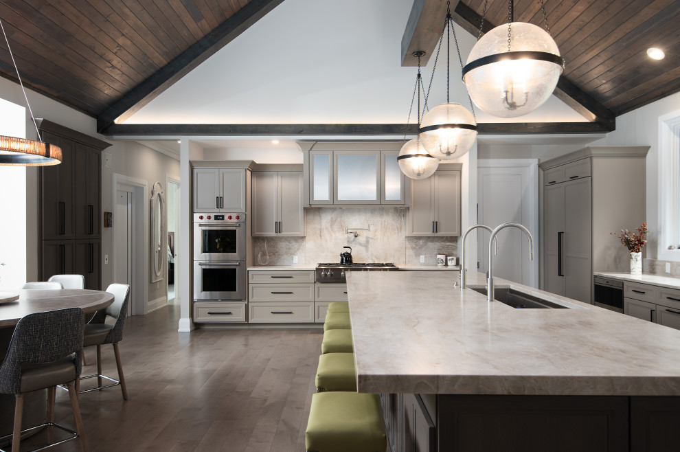 Large transitional galley eat-in kitchen photo in Chicago with recessed-panel cabinets, gray cabinets, wood countertops, beige backsplash, an island and beige countertops