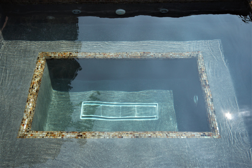 Hot tub - small backyard rectangular aboveground hot tub idea in Denver