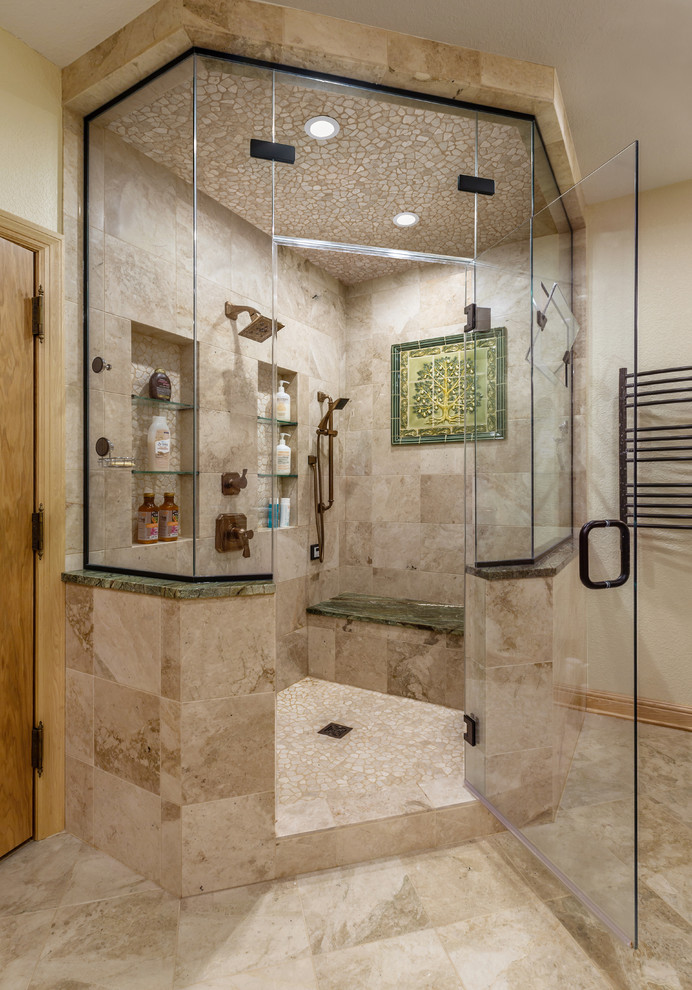 Inspiration for a mid-sized eclectic master bathroom in Milwaukee with flat-panel cabinets, medium wood cabinets, a freestanding tub, an open shower, beige tile, stone tile, beige walls, travertine floors, an undermount sink, marble benchtops, beige floor, an open shower and green benchtops.