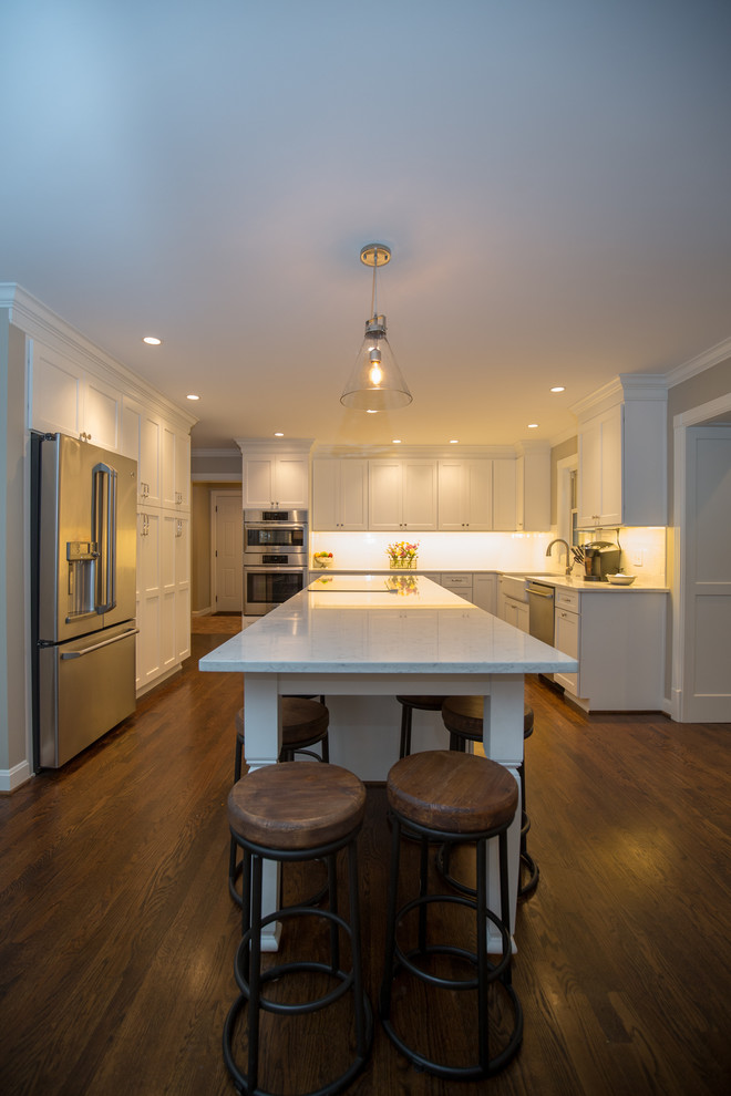 Inspiration for a large transitional medium tone wood floor kitchen remodel with a farmhouse sink and stainless steel appliances