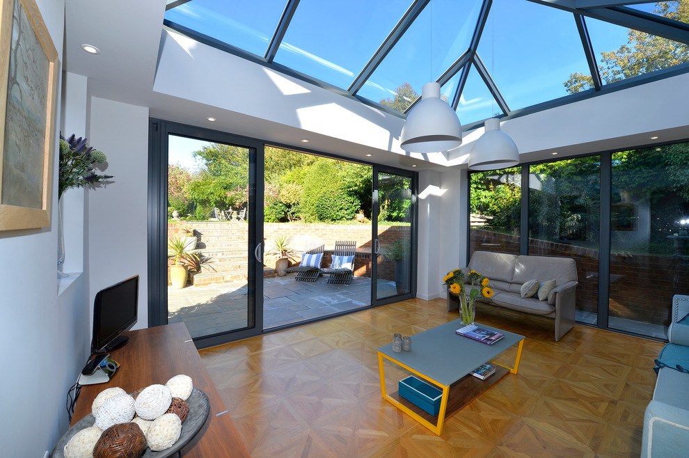 Photo of a contemporary sunroom in Other.