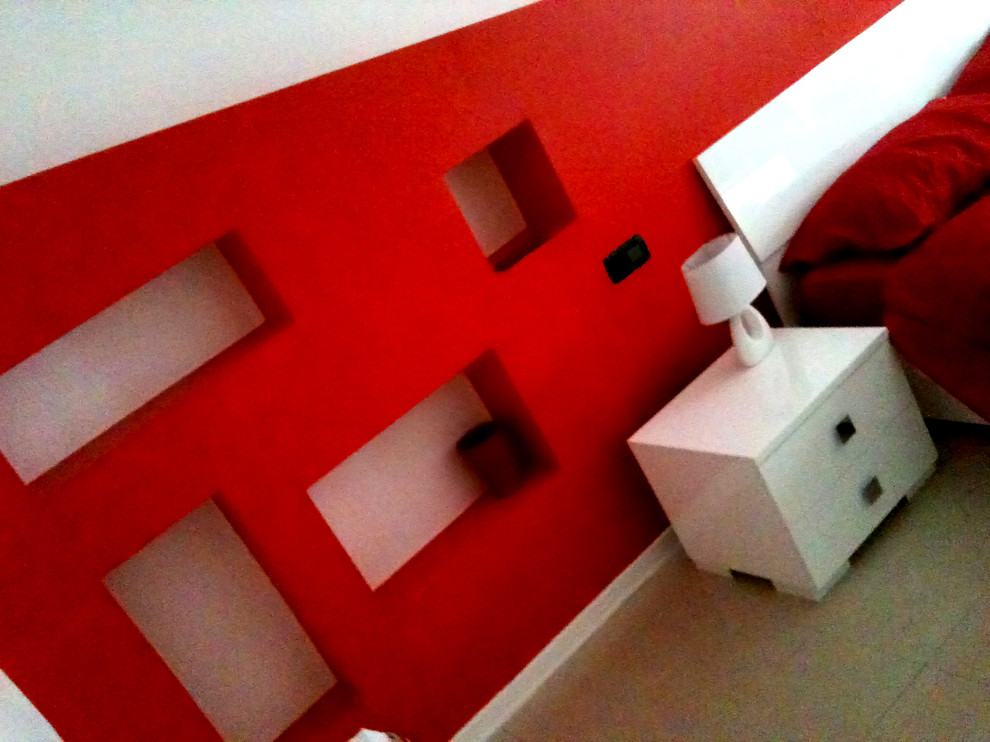 Testata del letto con arredo fisso in cartongesso