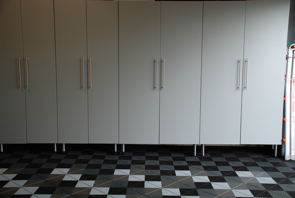 Example of a large classic attached two-car garage design in Philadelphia