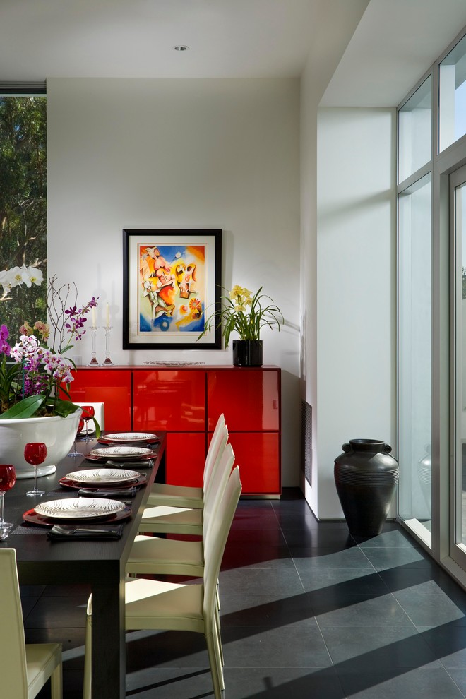 Inspiration for a large modern open plan dining in Santa Barbara with white walls, ceramic floors and black floor.