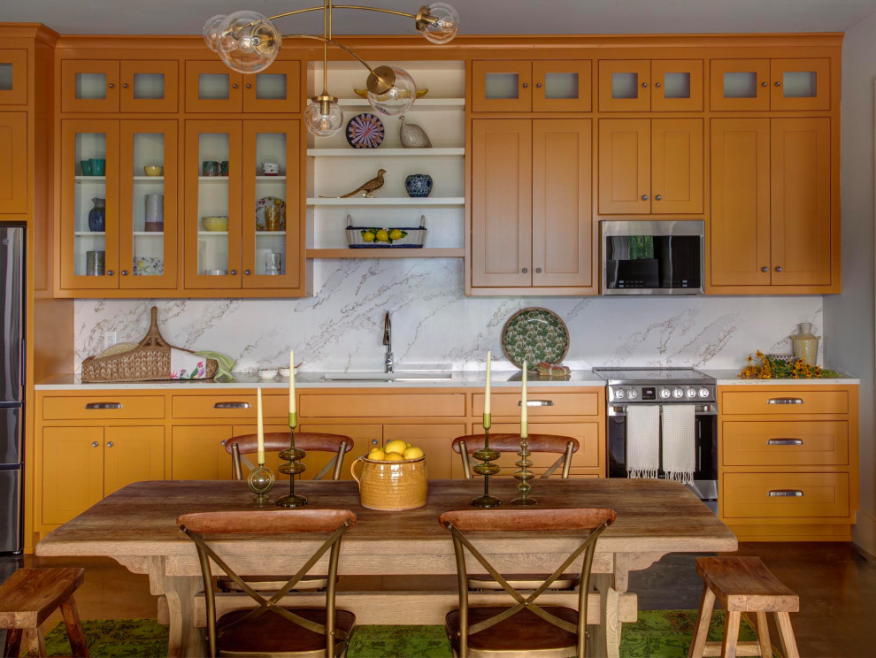 Inspiration for a huge transitional single-wall concrete floor and black floor eat-in kitchen remodel in Richmond with a drop-in sink, beaded inset cabinets, yellow cabinets, quartz countertops, white backsplash, quartz backsplash, stainless steel appliances, no island and white countertops