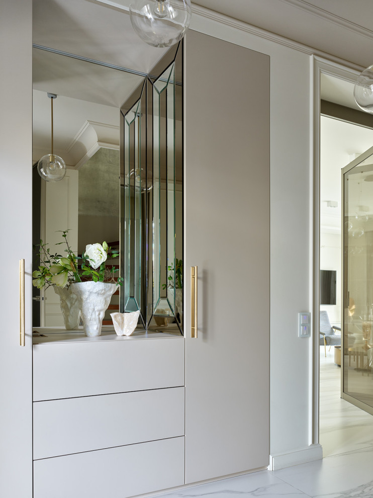 Создание ниш для мебели - один из удачных приемов дизайнеров. Он позволяет избав