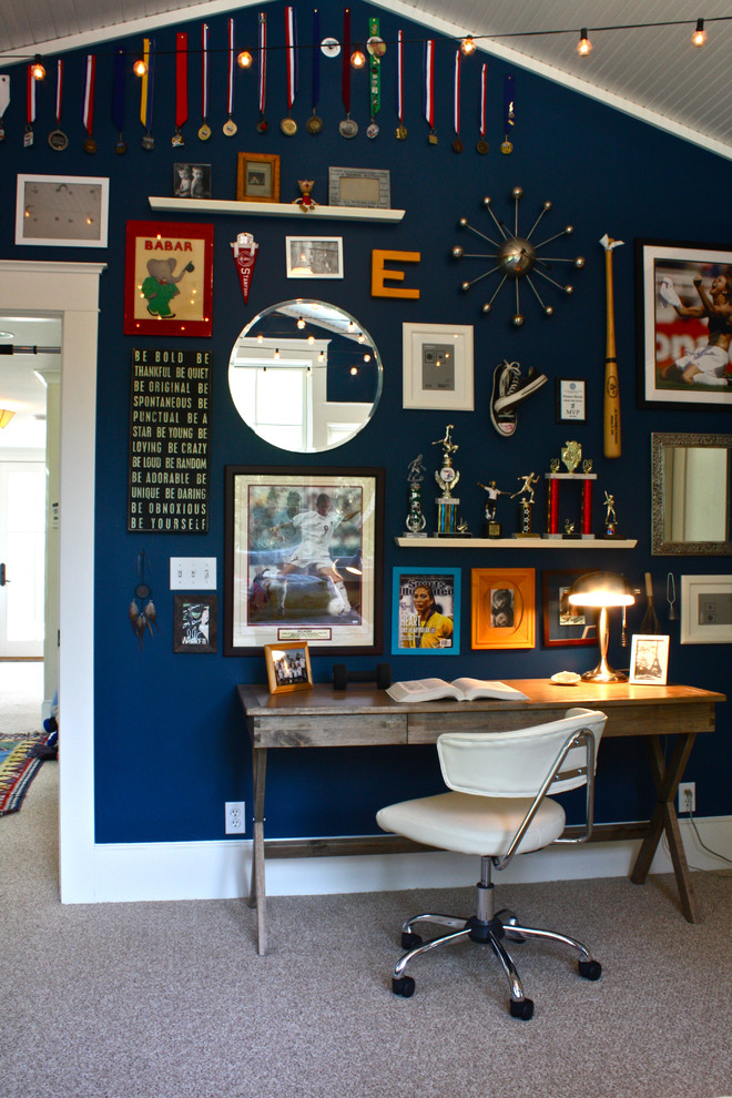 This is an example of a traditional gender-neutral kids' room in San Francisco with blue walls and carpet.