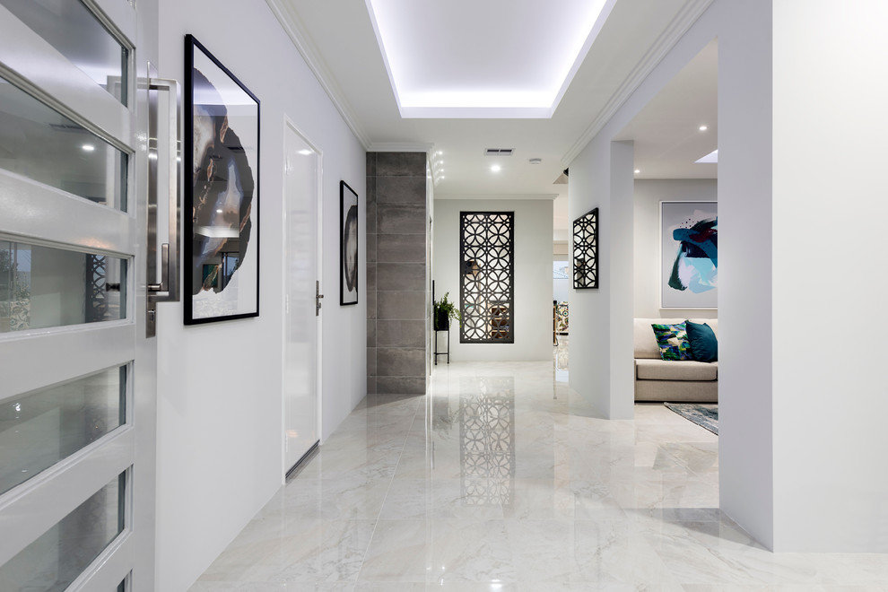 Photo of a large contemporary foyer in Perth with white walls, porcelain floors, a single front door, a white front door and white floor.