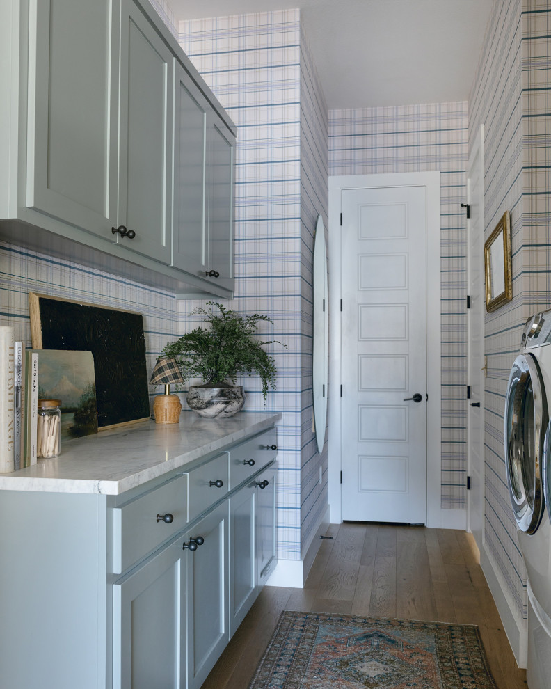Fresh Vintage-Inspired Wallpapers in an Austin Home - This laundry room features Chasing Paper's "Vintage Plaid" wallpaper on the walls.