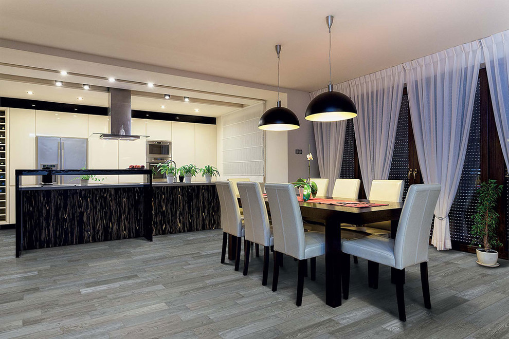 Kitchen/dining room combo - mid-sized transitional gray floor kitchen/dining room combo idea with no fireplace