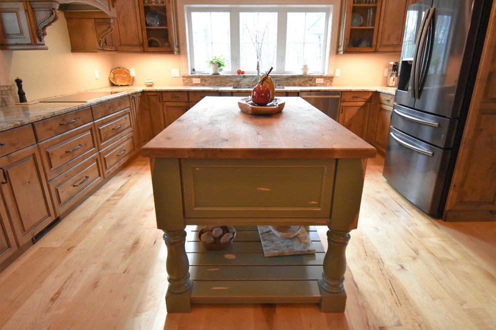 Kitchen - huge rustic kitchen idea with distressed cabinets