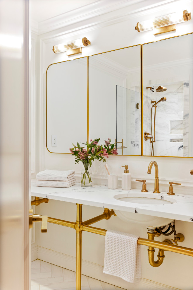 Bathroom - transitional single-sink bathroom idea with white walls, an undermount sink and white countertops