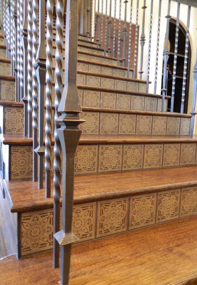 Traditional wood straight staircase in Dallas with tile risers and metal railing.