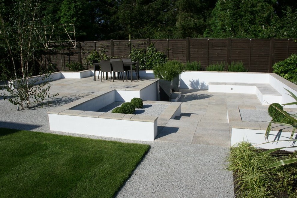 Mid-sized contemporary backyard full sun formal garden in Other for summer.