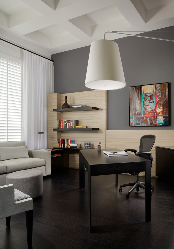 This is an example of a contemporary home office in Miami with grey walls.