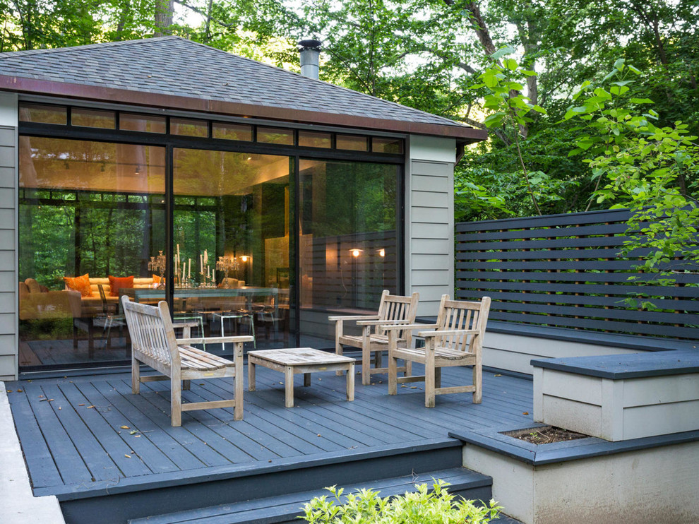 Photo of a mid-sized contemporary backyard deck in DC Metro with no cover.