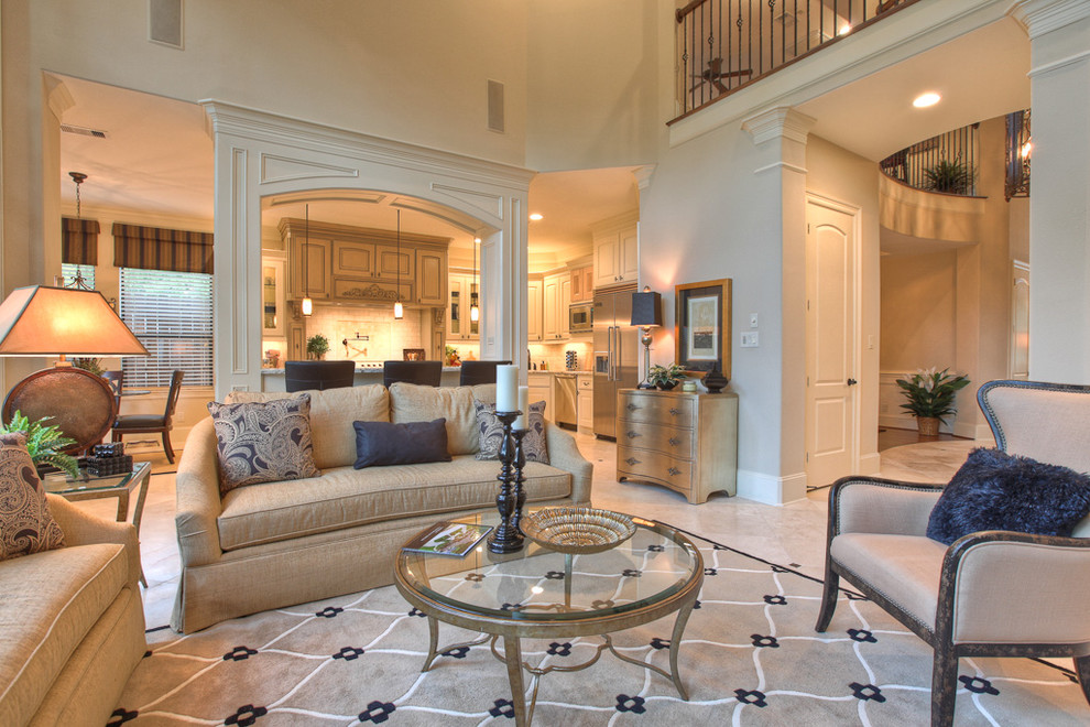 Inspiration for a traditional living room in Houston with beige walls.