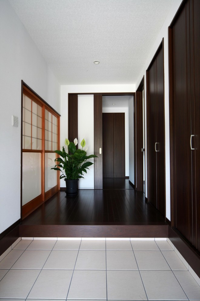 Inspiration for a mid-sized modern entryway in Other.