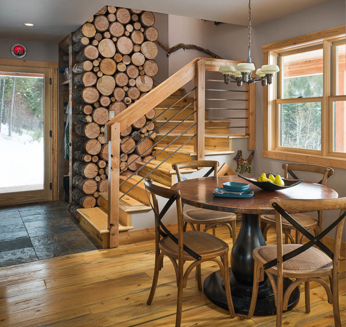 Inspiration for a small rustic light wood floor and brown floor great room remodel with white walls