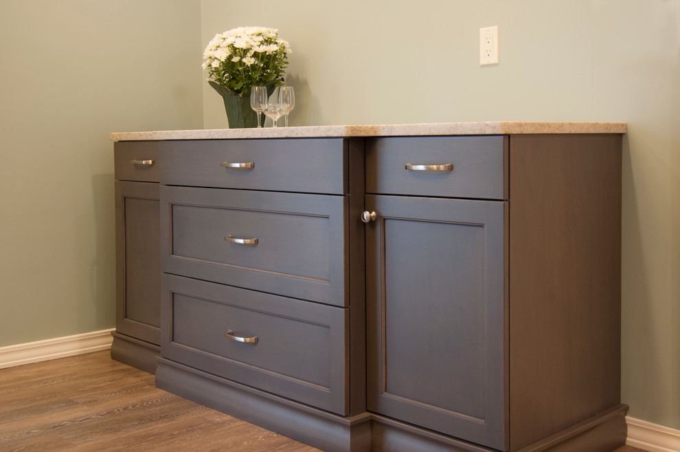 Mid-sized transitional l-shaped vinyl floor kitchen/dining room combo photo in Chicago with recessed-panel cabinets, gray cabinets, quartz countertops, no island and blue walls