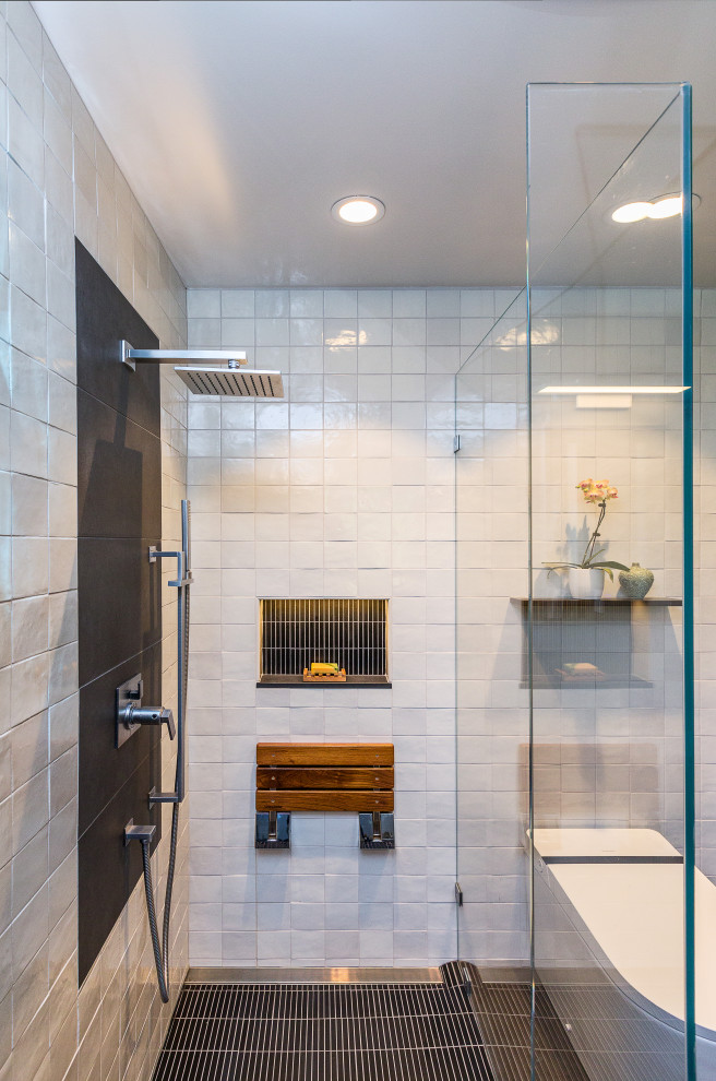 Photo of a small midcentury master bathroom in Santa Barbara with flat-panel cabinets, black cabinets, a curbless shower, a bidet, gray tile, terra-cotta tile, grey walls, slate floors, an undermount sink, engineered quartz benchtops, grey floor, a hinged shower door, black benchtops, a niche, a double vanity and a built-in vanity.