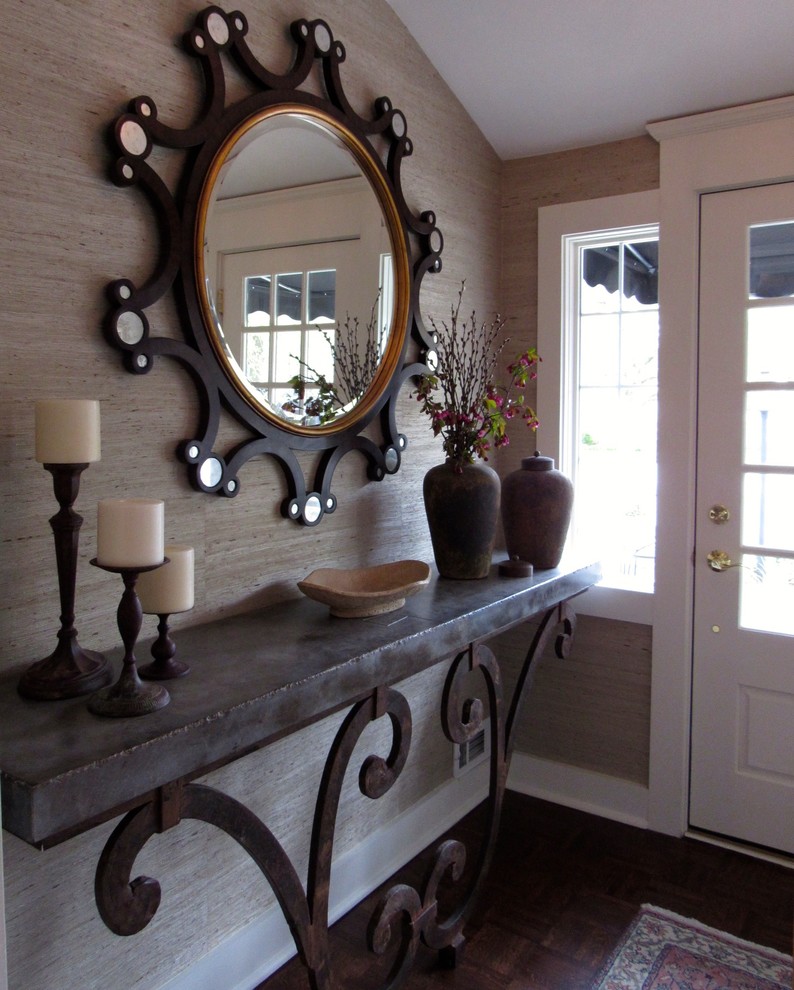 Foyer - small transitional dark wood floor foyer idea in Chicago