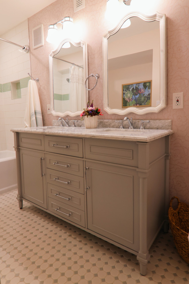 Design ideas for a medium sized classic family bathroom in Atlanta with freestanding cabinets, grey cabinets, a built-in bath, a shower/bath combination, a two-piece toilet, pink walls, ceramic flooring, a submerged sink, white floors, a shower curtain, grey worktops, double sinks, a freestanding vanity unit and wallpapered walls.