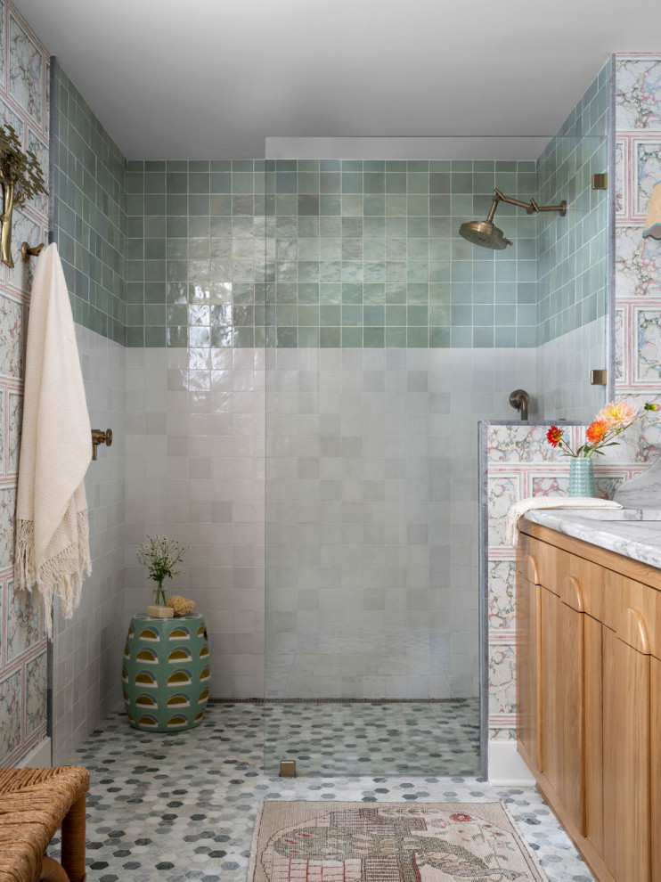 Example of a mid-sized 1950s master green tile and terra-cotta tile marble floor, multicolored floor, double-sink and wallpaper bathroom design in Atlanta with furniture-like cabinets, light wood cabinets, a two-piece toilet, white walls, an undermount sink, marble countertops, white countertops and a built-in vanity
