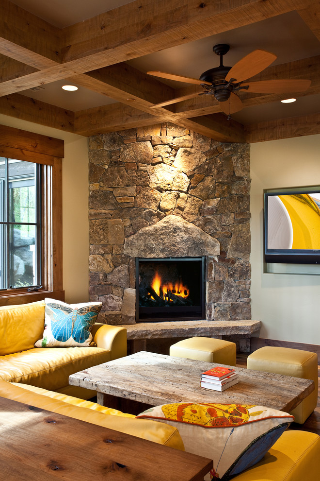 Country family room in Salt Lake City with a corner fireplace.