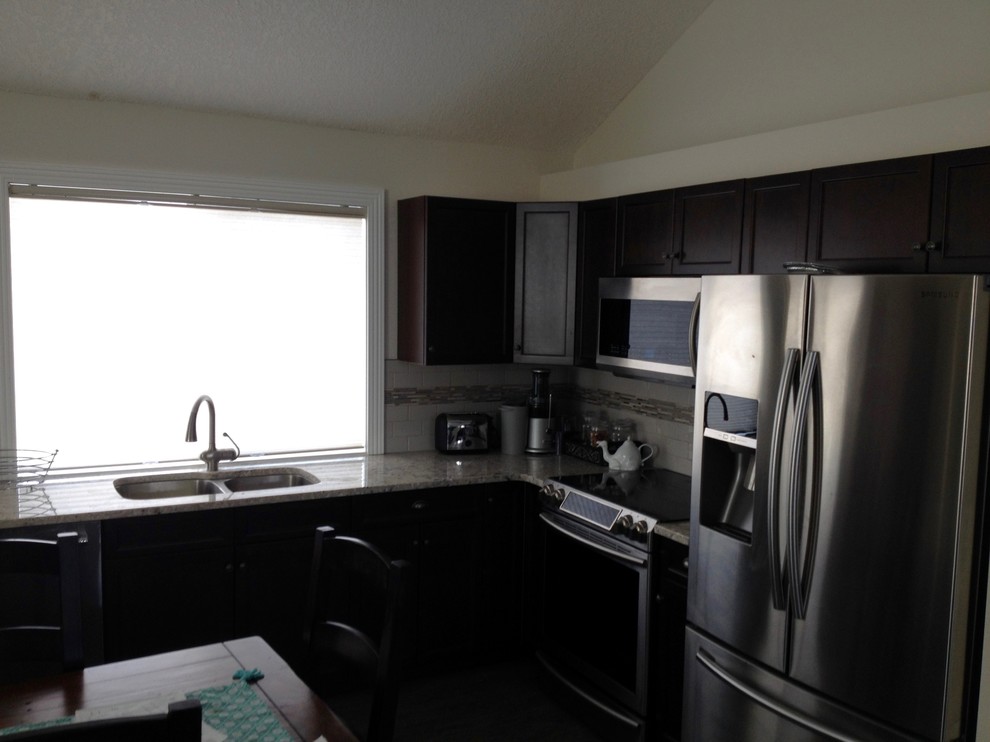 Kitchen - rustic kitchen idea in Calgary