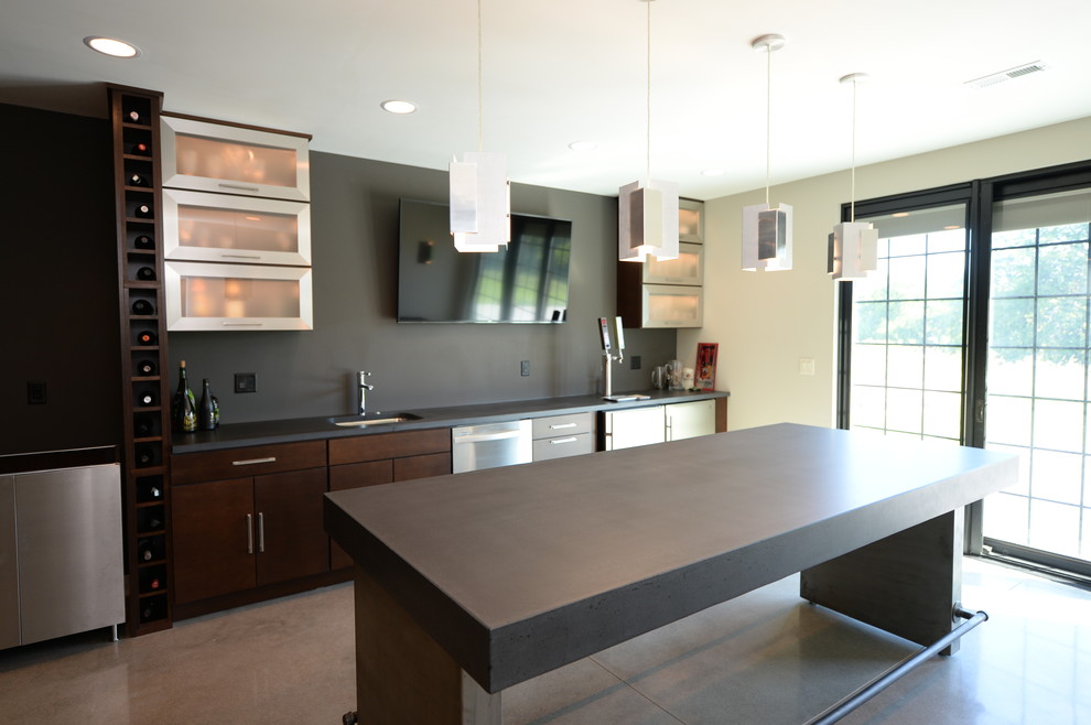 Mid-sized transitional walk-out concrete floor basement photo with gray walls