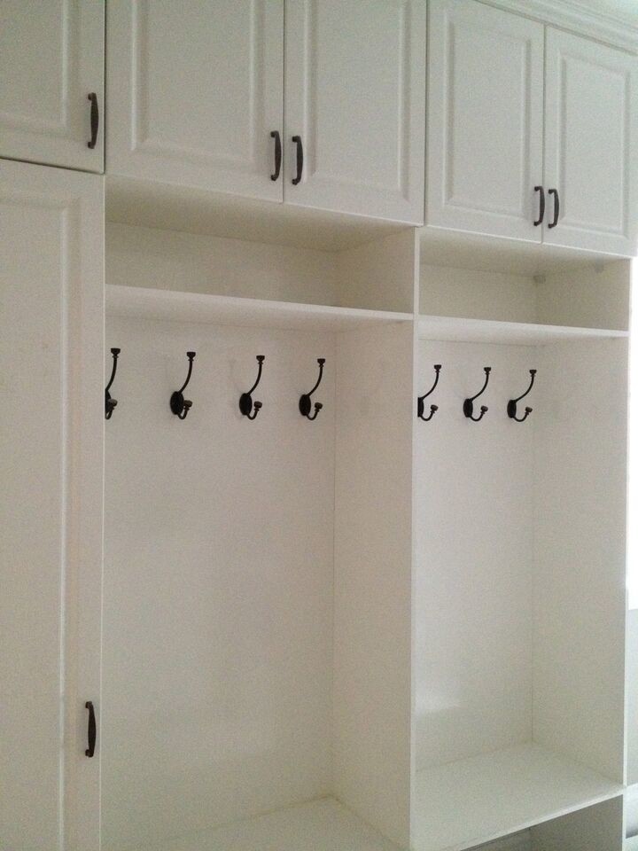 Mudroom - mid-sized transitional mudroom idea in Toronto with white walls