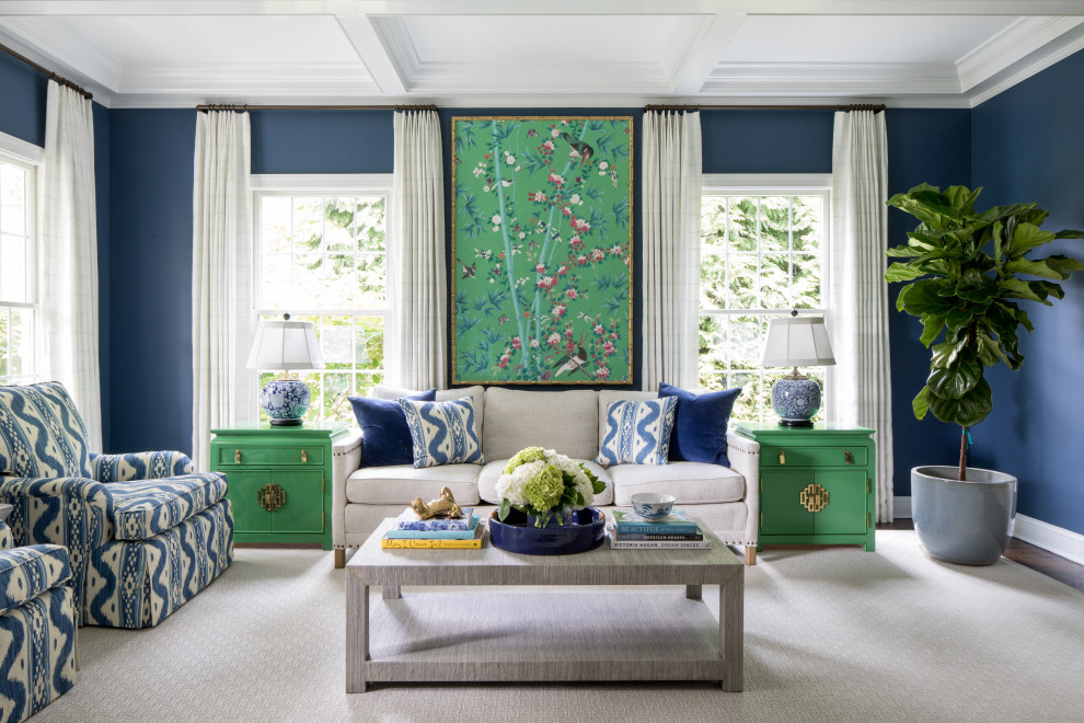 Design ideas for a traditional living room in New York with blue walls, dark hardwood floors and brown floor.