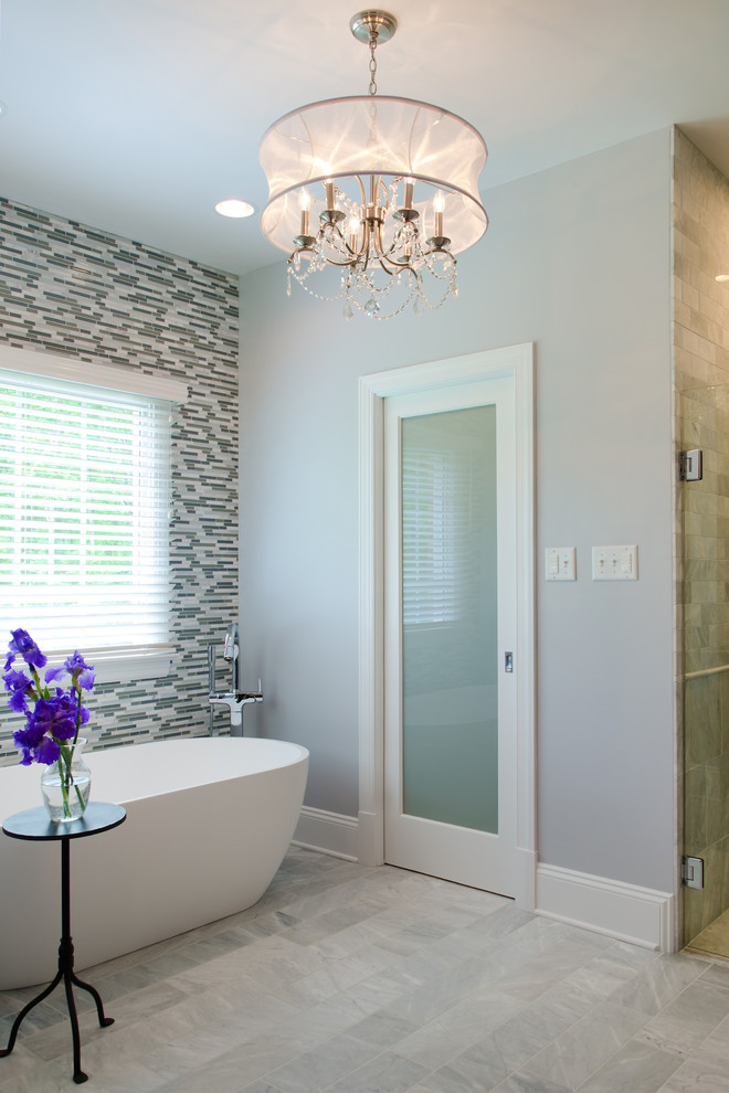 Design ideas for a large transitional master bathroom in Richmond with recessed-panel cabinets, dark wood cabinets, a freestanding tub, gray tile, white tile, matchstick tile, grey walls, porcelain floors and granite benchtops.