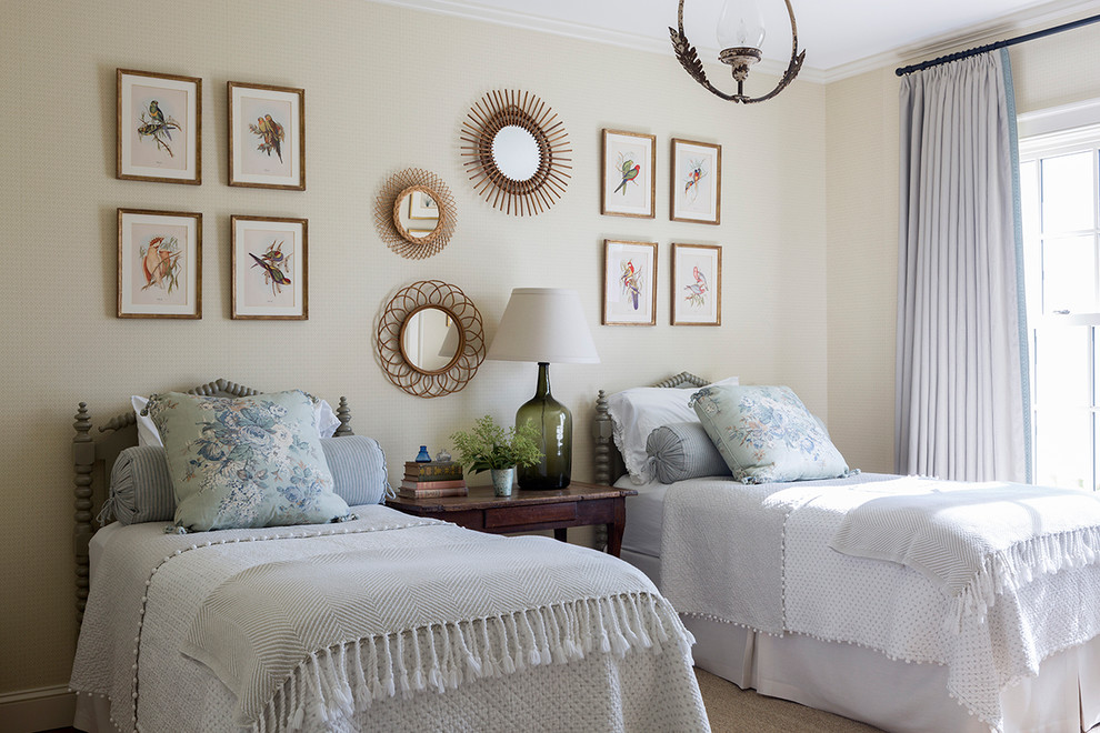 Photo of a large country guest bedroom in Bridgeport with beige walls, medium hardwood floors, no fireplace and brown floor.