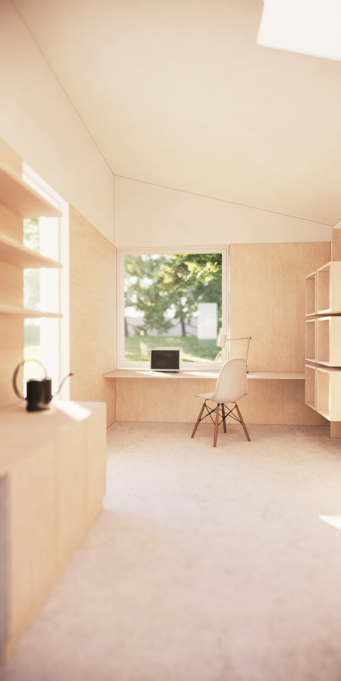 Foto di un piccolo atelier minimal con pareti bianche, pavimento in cemento, scrivania incassata, pavimento grigio e pannellatura