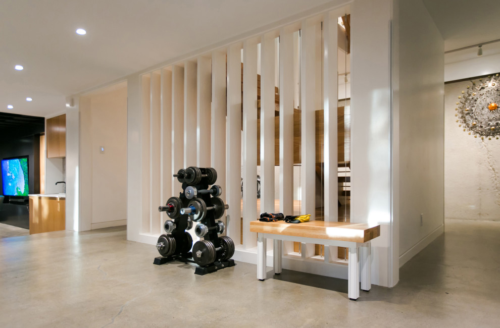 Foto de escalera en L escandinava de tamaño medio sin contrahuella con escalones de madera y barandilla de madera
