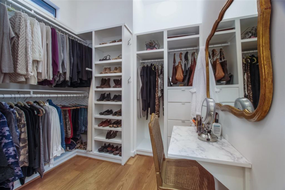 Design ideas for a small traditional storage and wardrobe in Houston.