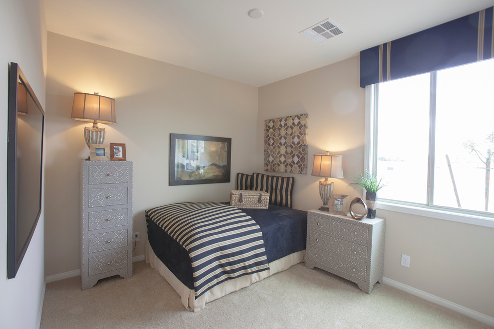 Photo of a small traditional guest bedroom in Las Vegas with beige walls and carpet.