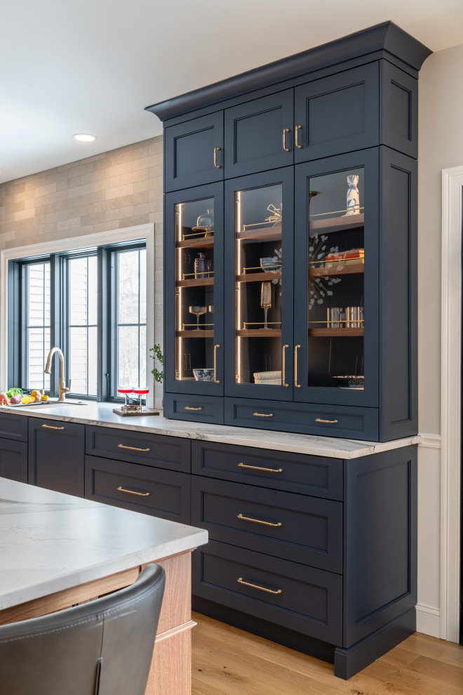 Example of a transitional home design design in Boston