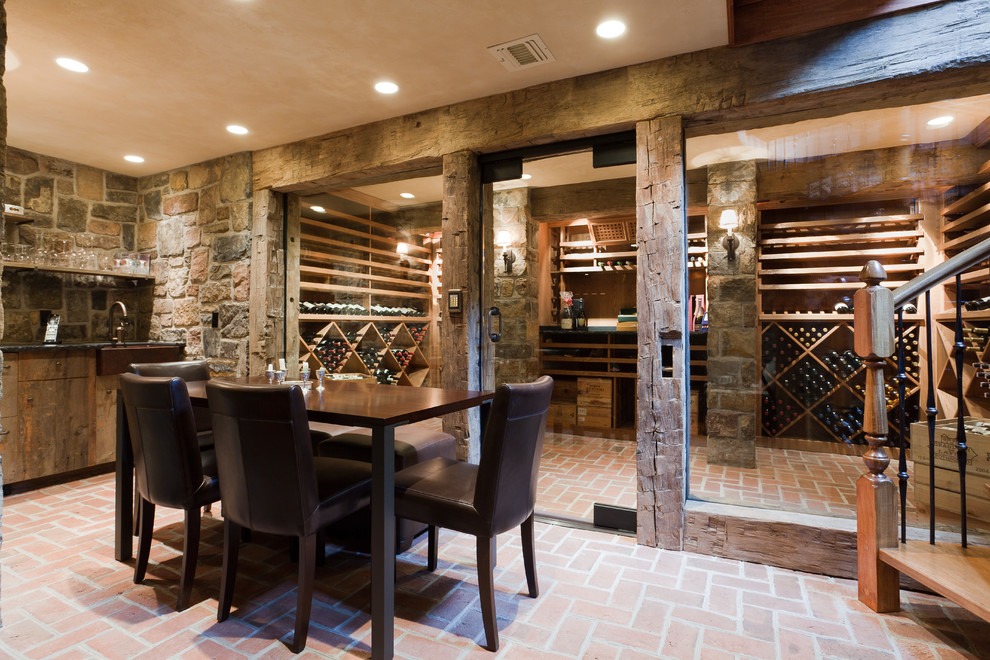 Inspiration for a large contemporary wine cellar in New York with brick floors, diamond bins and brown floor.